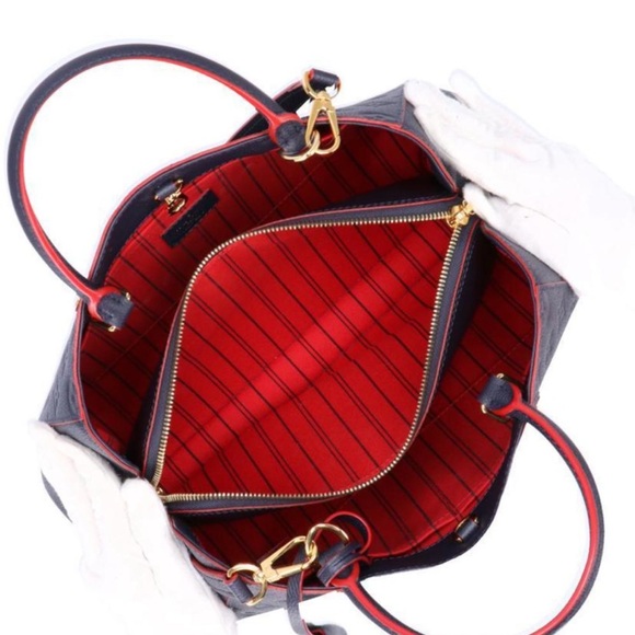 LOUIS VUITTON Montaigne BB
Marine Rouge Navy Bag Empreinte Leather - Picture 2 of 5